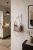 Metall-Garderobe-fuer-den-Flur-Stillia---skulpturale-Wandgarderobe