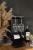 Metalowy-stojak-na-wino-na-2-kieliszki.webp